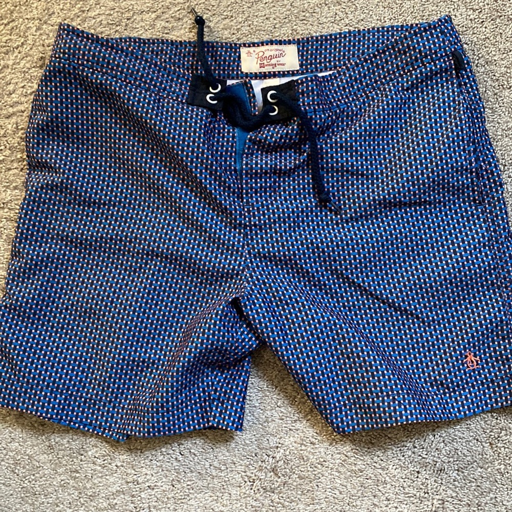 Original Penguin swim trunks.